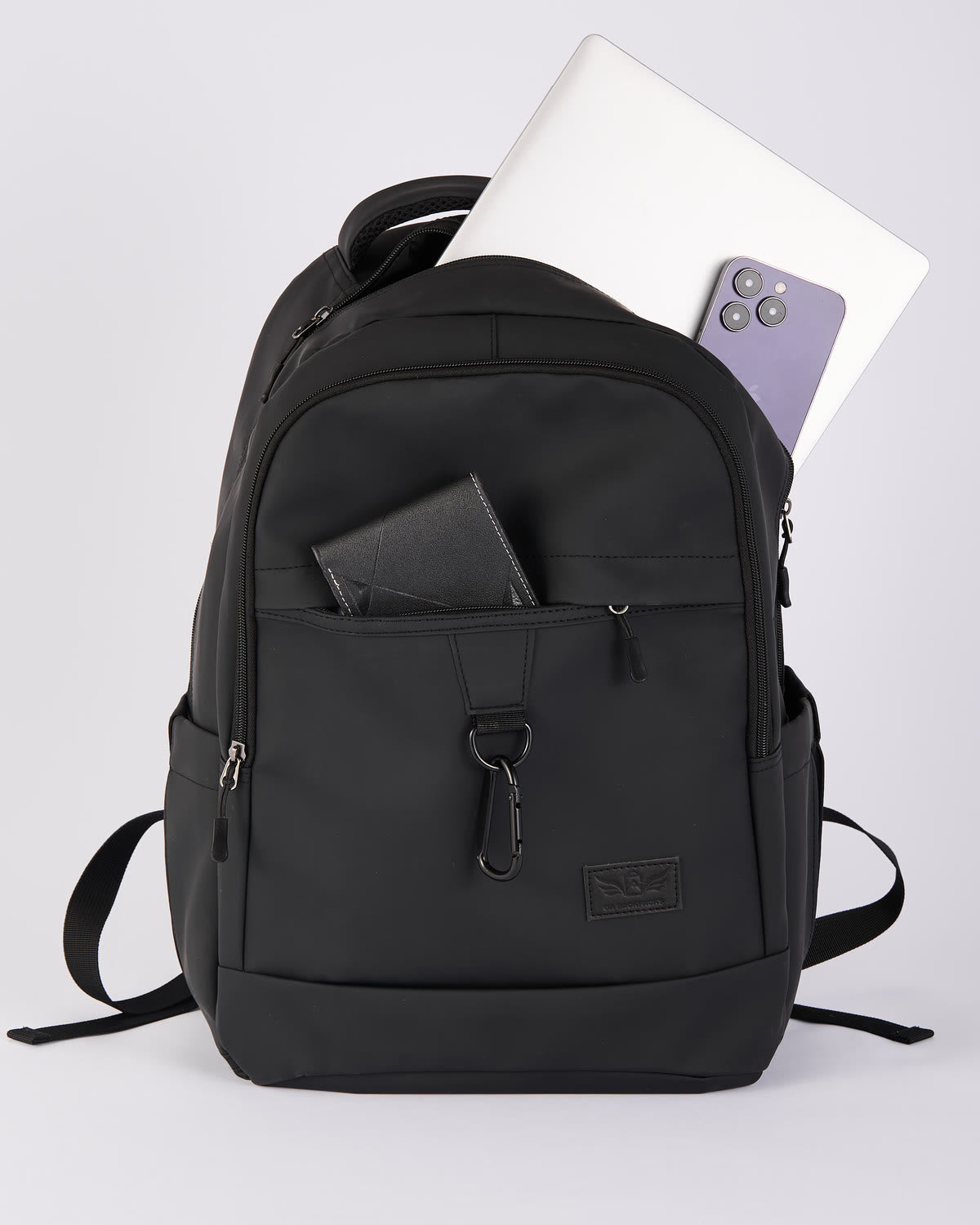 GA Backpack packed with a laptop, wallet and phone