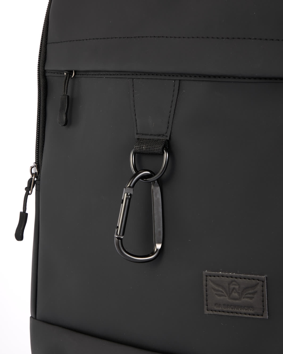 The everyday backpack with discreet protection built in., matte carabiner d-ring and embossed emblem